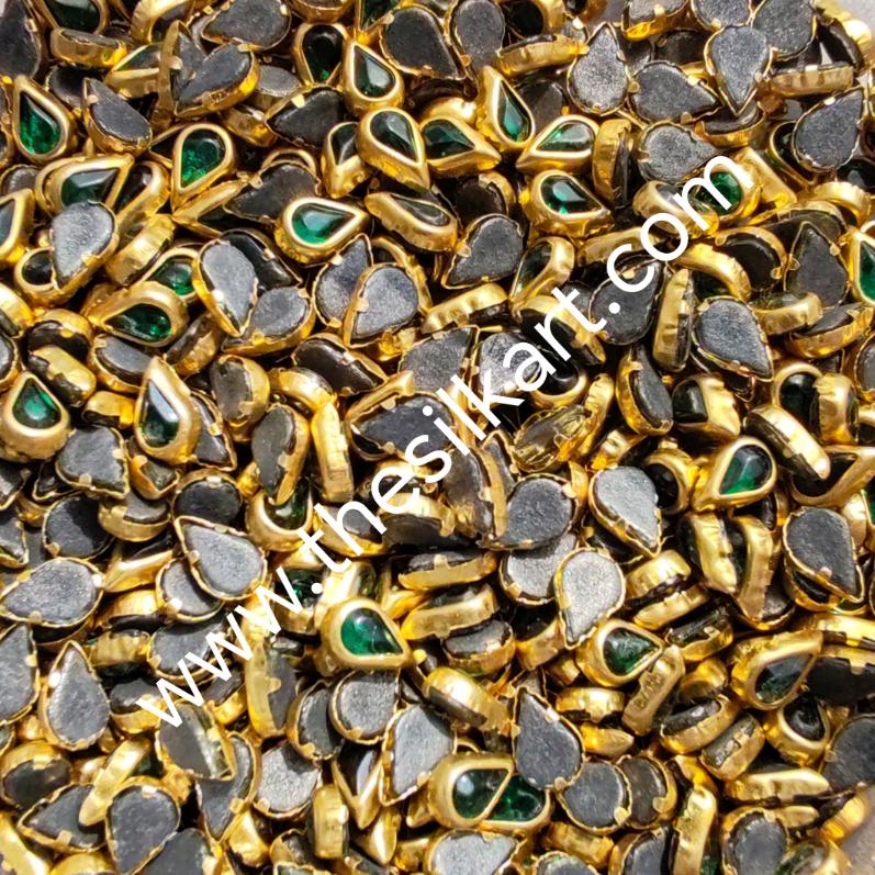 Tilakam shape dark green glass