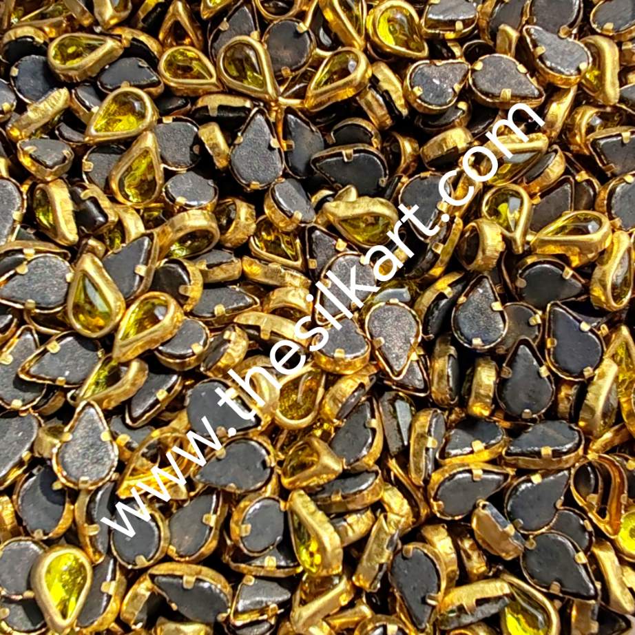 Tilakam shape yellow glass