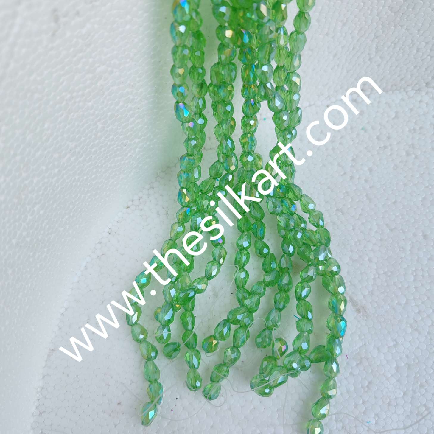 drop shape crystal beads-light green