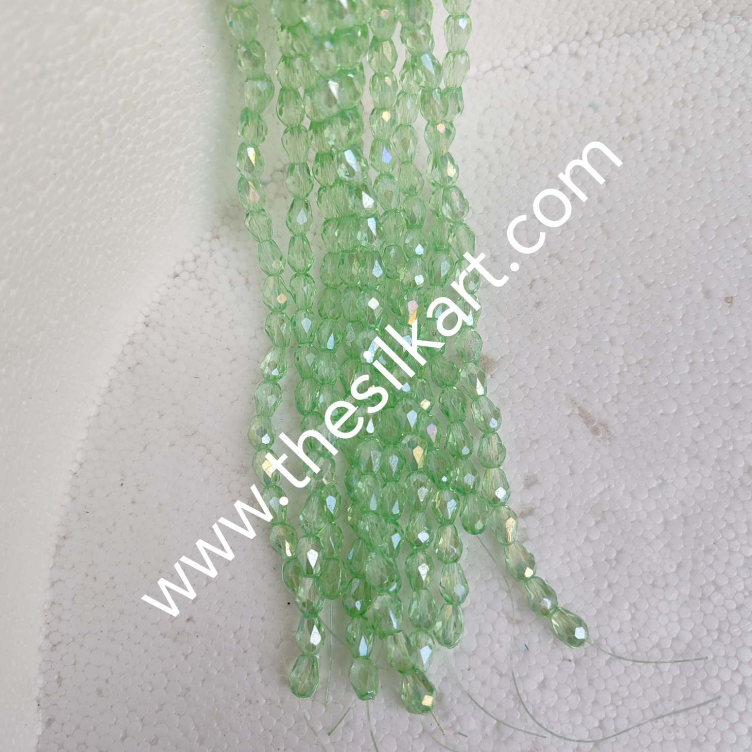 drop shape crystal beads-pista green