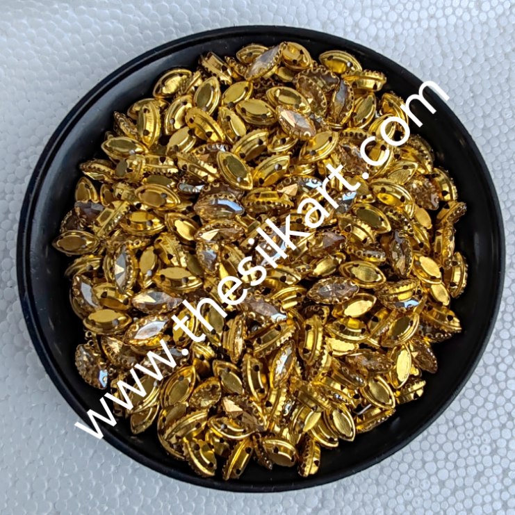 10*6 size eye shape gold colour clipstones