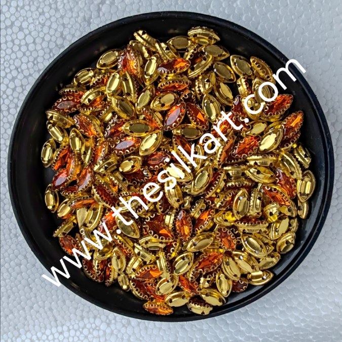 10*6 size eye shape orange colour clipstones